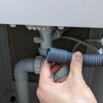 Washing machine drain pipe repair